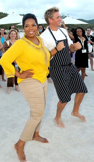 Oprah kicks some sand with Curtis, and 93 lucky US guests and crew. © SW